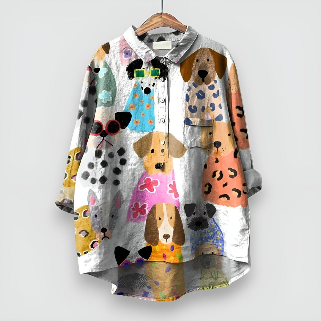 Playful dog print women's long sleeve collared blouse. Button-front design offers versatile casual & office chic style.