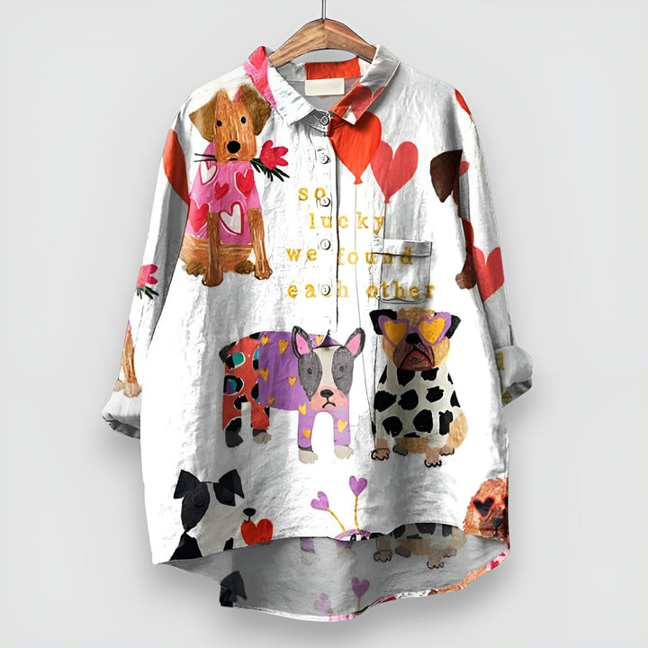 Unique ladies dog print button-front blouse. Comfortable long sleeve top for a charming, versatile look.