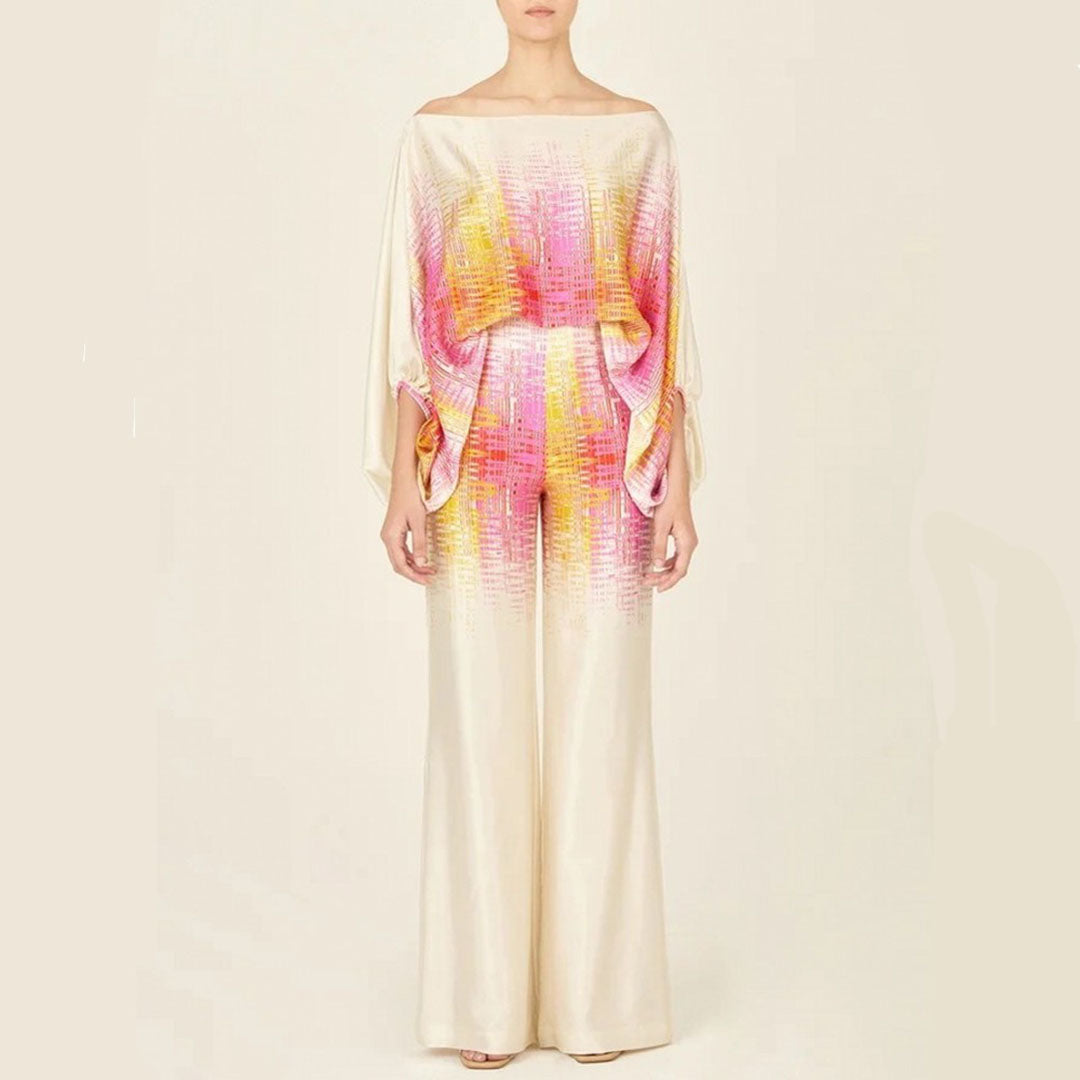 High-waisted shorts and off-shoulder top make up this chic women's two-piece summer printed set.