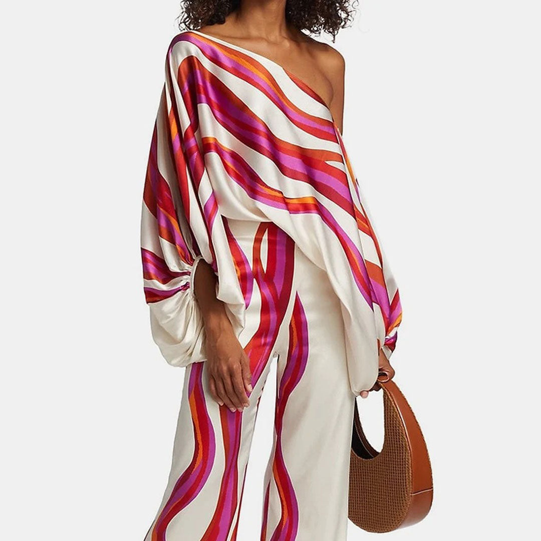 Matching women's off-shoulder top and high-waisted shorts set, a comfortable summer fashion choice.