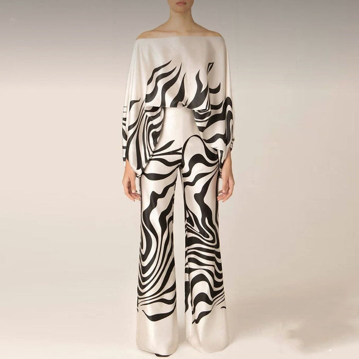 Trendy women's off-shoulder two-piece ensemble, a must-have casual printed set for summer fashion.