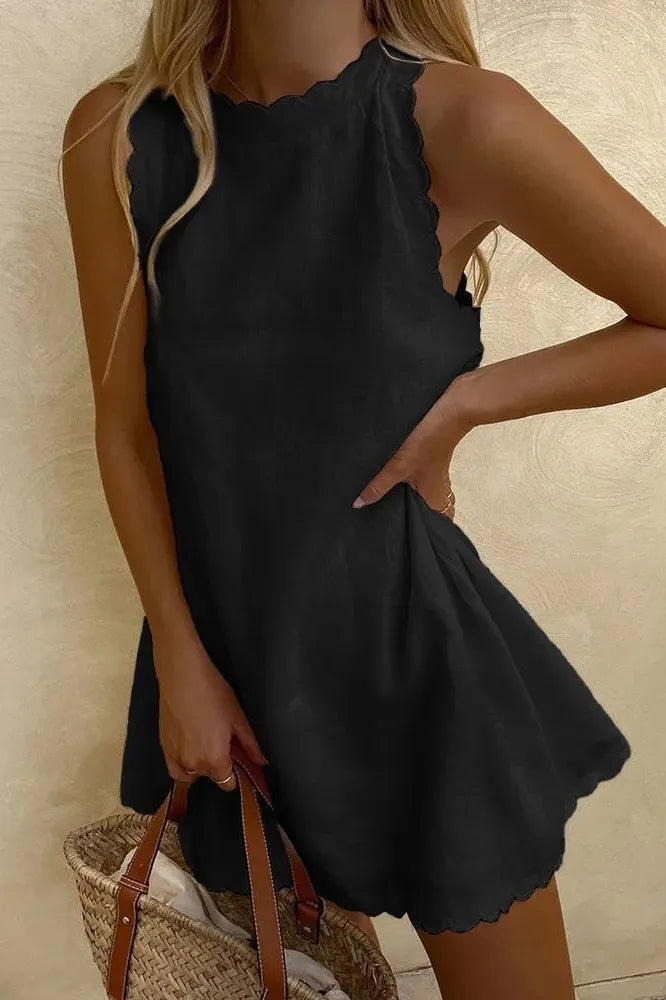 Streamlined women's tailored mini dress, a chic and modern short dress for versatile wear.