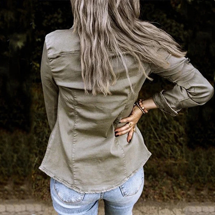 Fashionable women's denim jacket, a spring outerwear essential. Versatile long sleeve button-up for stylish casual wear.