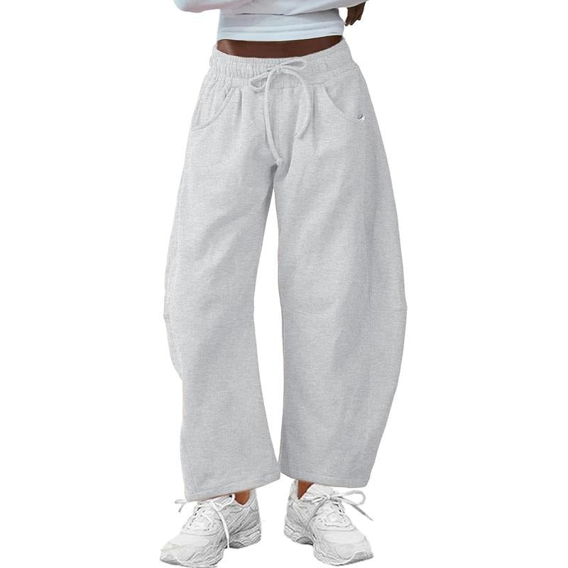 Stylish women's barrel-leg pants featuring a comfortable fit, cotton blend material, and practical drawstring