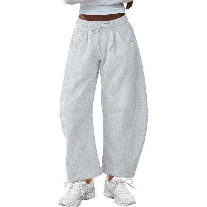Stylish women's barrel-leg pants featuring a comfortable fit, cotton blend material, and practical drawstring
