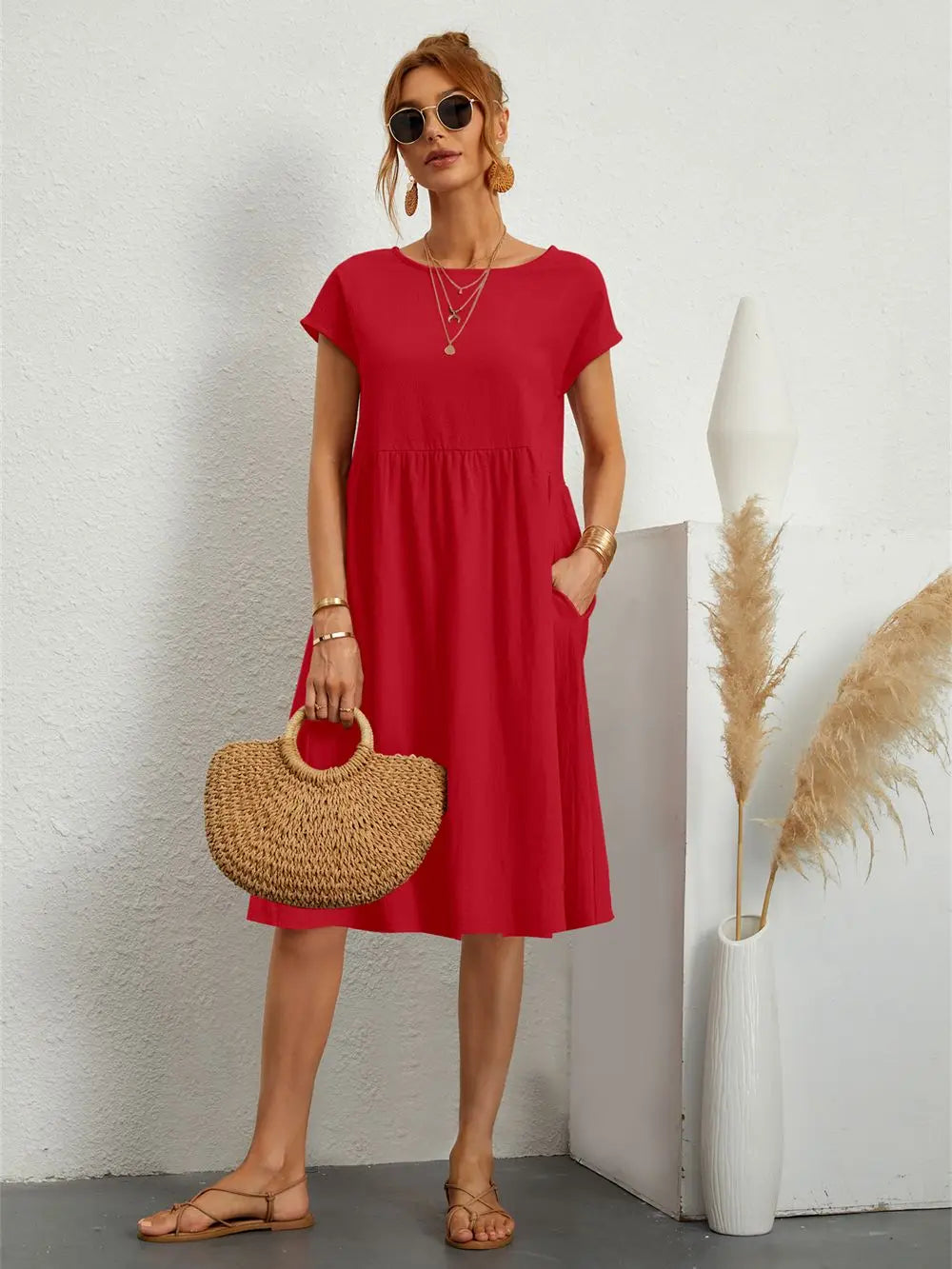Women's comfortable casual midi dress with pockets, perfect for everyday wear.