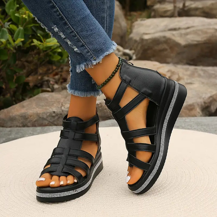Close-up of soft straps on women's casual wedge sandals, emphasizing comfort and quality summer footwear.