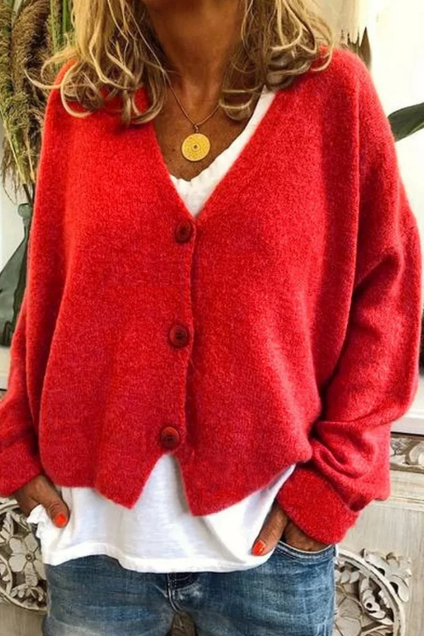 Relaxed fit women's cozy button cardigan, a comfortable layering piece.
