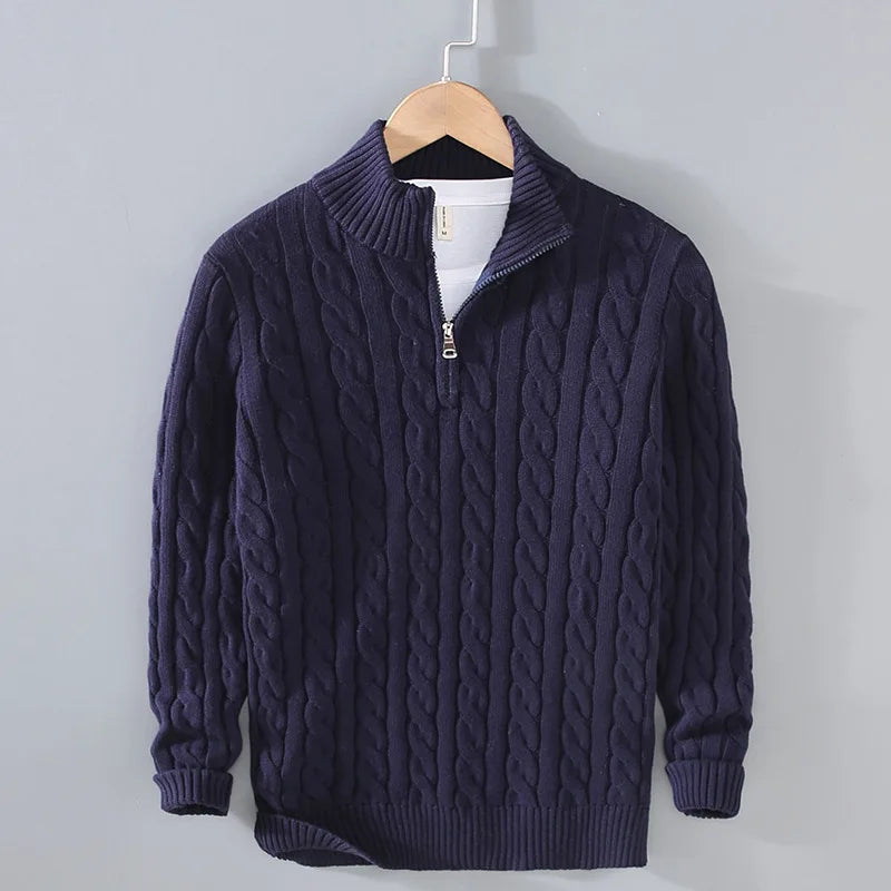 Soft knit texture of a women's half-zip cable knit sweater, ideal for everyday casual outfits.