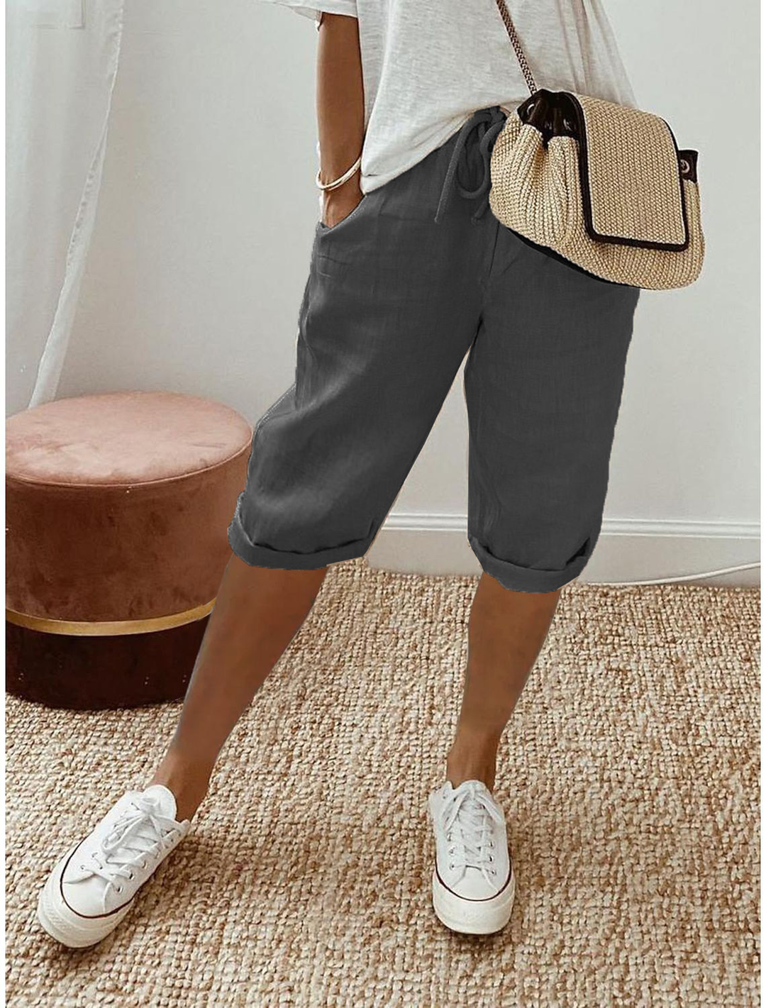 Comfortable women's cropped pull-on shorts. Straight leg design, elastic waist for versatile casual summer apparel.