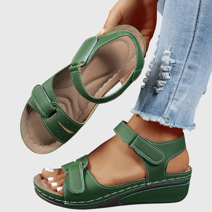 Comfortable women's walking sandals with crystal accents and orthopedic arch support.