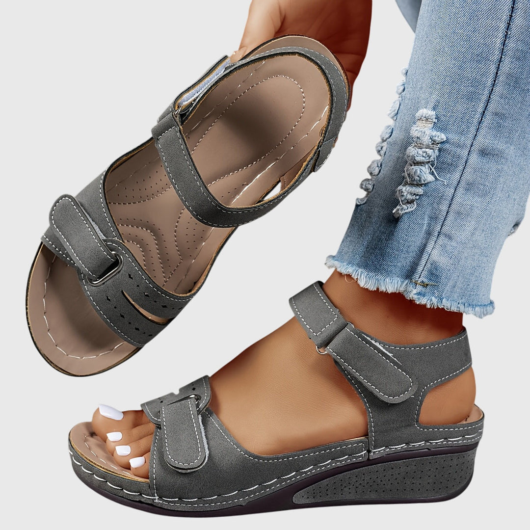 Orthopedic women's sandals with sparkling crystal details, designed for ultimate arch support.