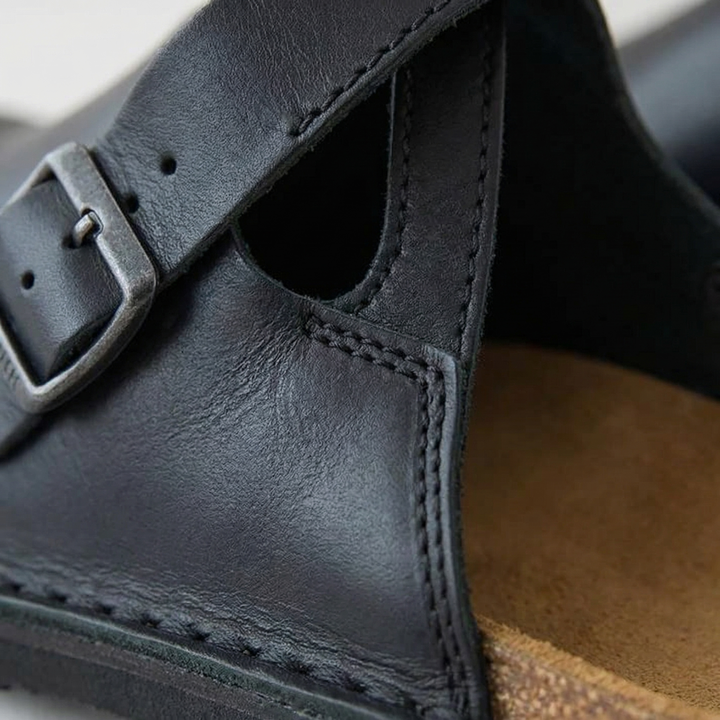 Brown women's cushioned clogs, easy slip-on footwear providing excellent support for all-day comfort.