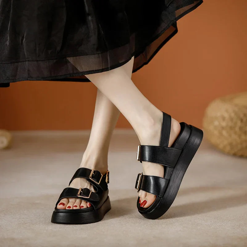 Open-toe platform sandals in black vegan leather with adjustable double buckles for women