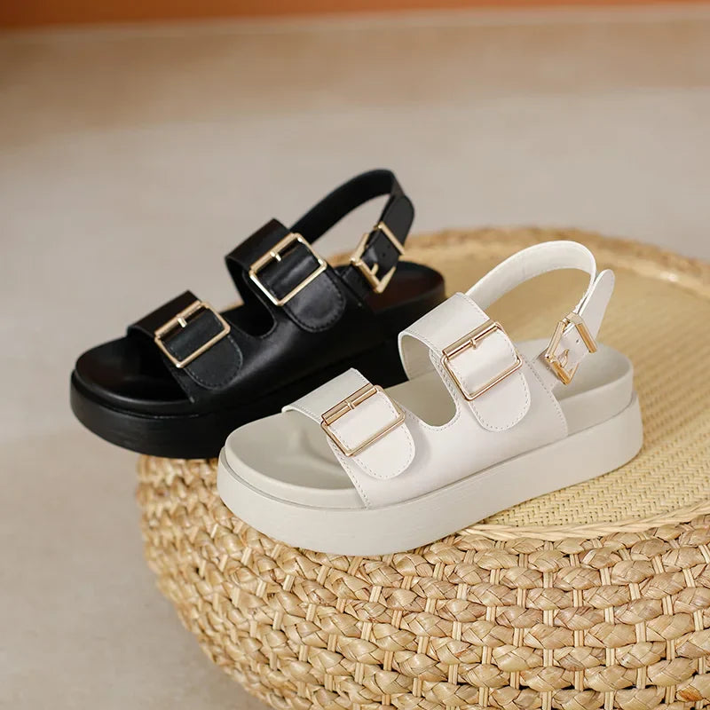 Fashionable black platform sandals for women featuring two prominent buckles