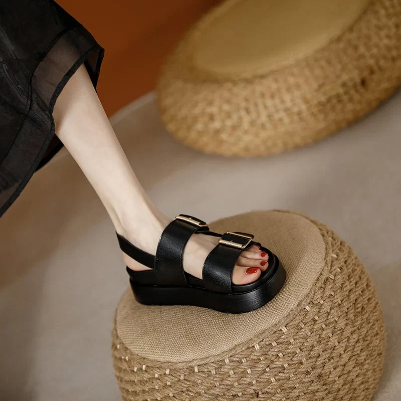 Summer-ready women's sandals: black vegan leather platforms with double buckle closure