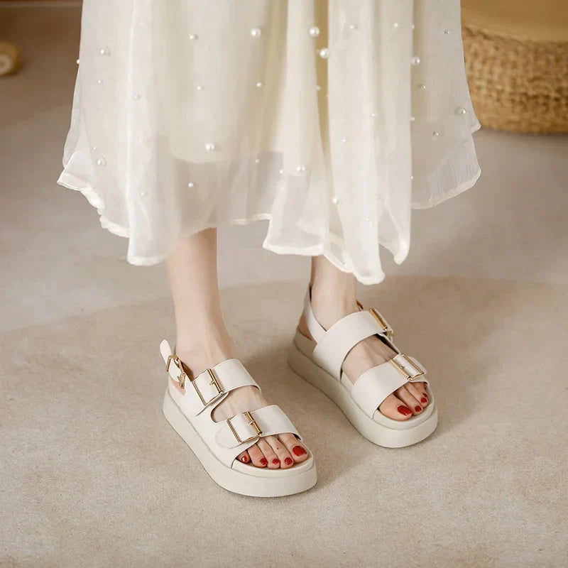 Women's casual black platform sandals with dual buckles for a secure and custom fit