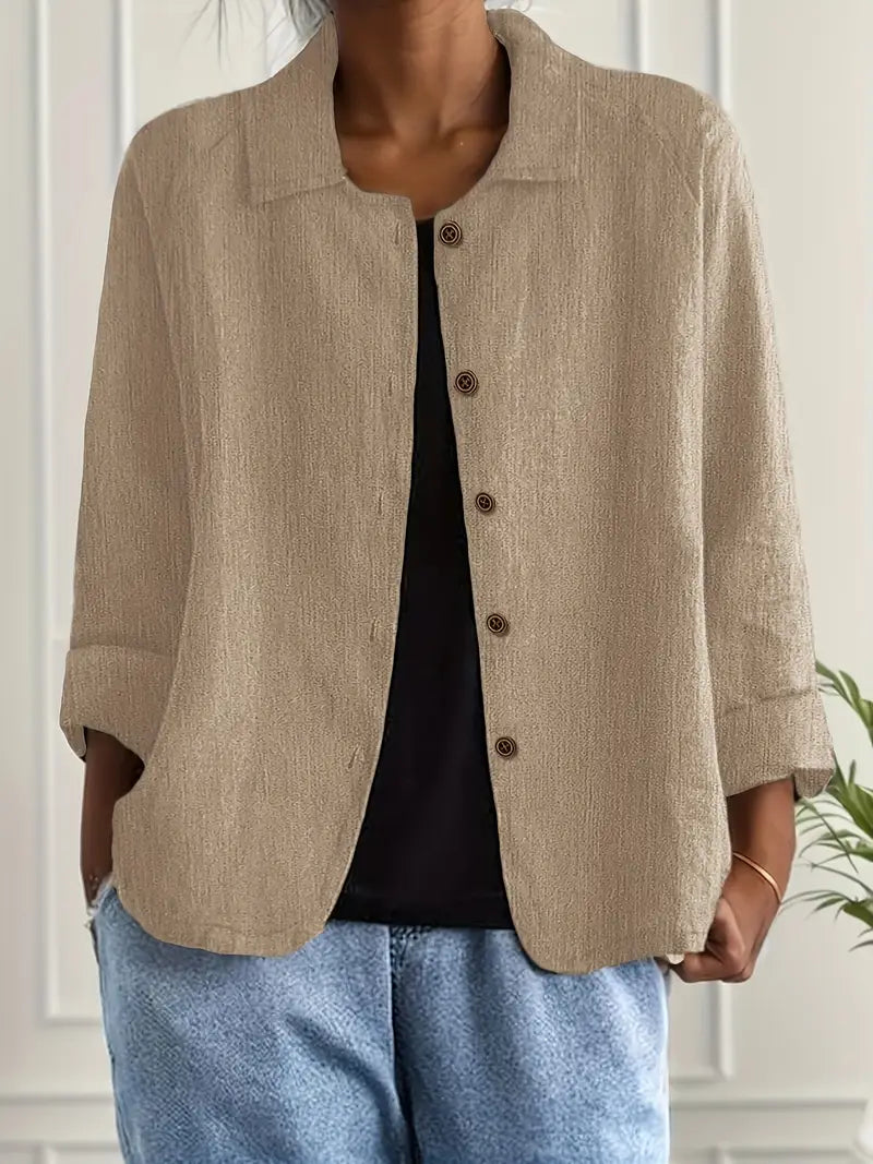Casual button-front women's top, relaxed fit, ideal for effortless everyday styling.