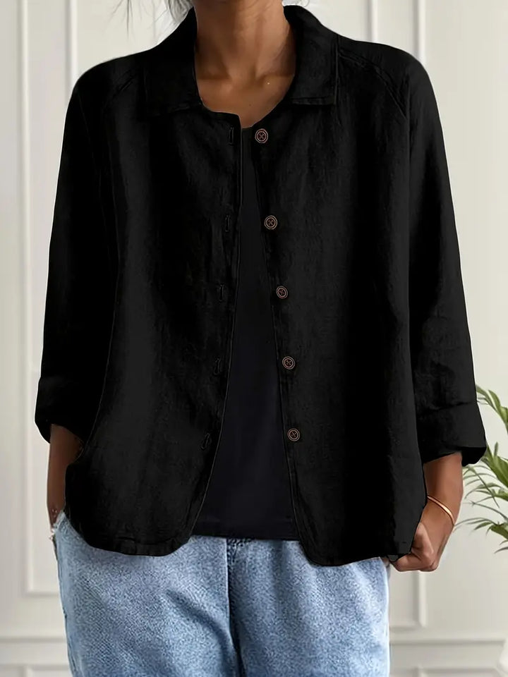 Spring women's collared top with 3/4 sleeves and a comfortable relaxed fit.