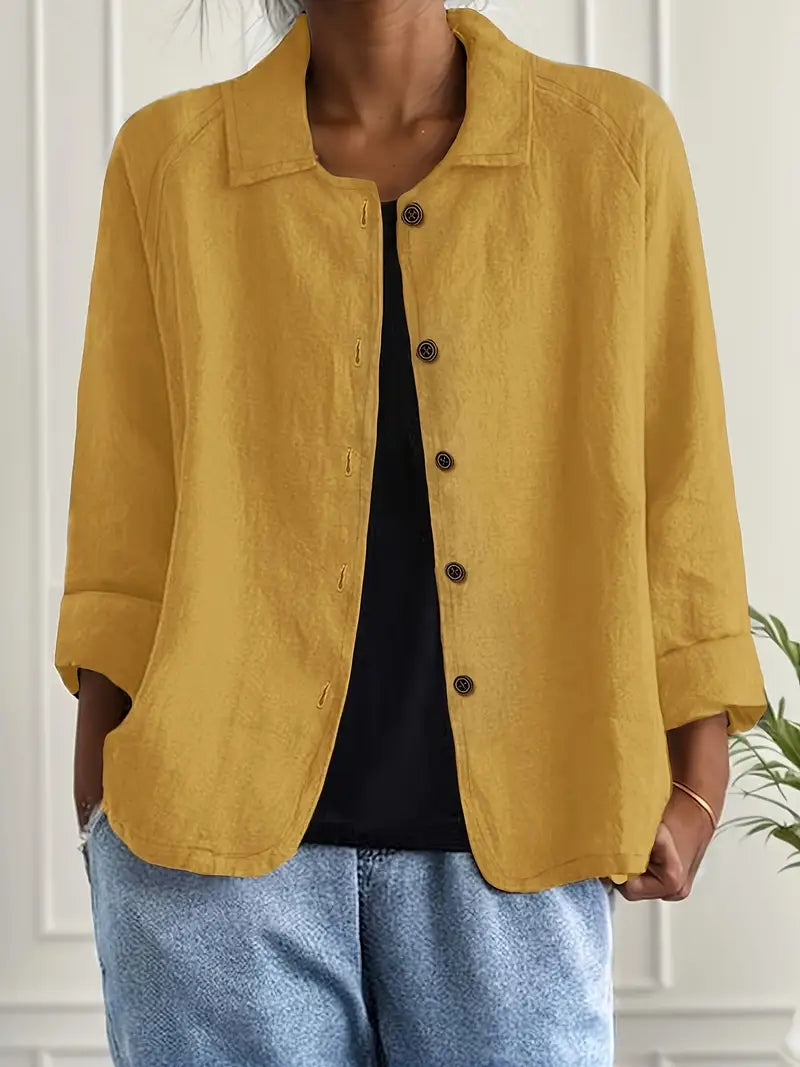 Relaxed fit women's casual top, button-front, with collared detail for a classic look.