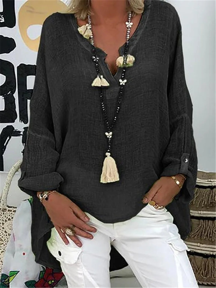Comfortable women's oversized top with a relaxed fit, great for everyday wear and versatile styling.