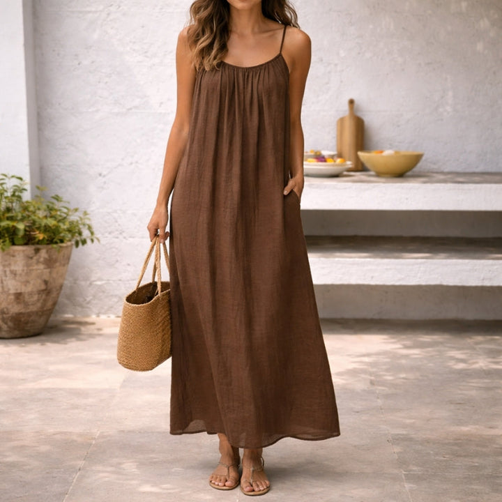 Women's Effortless Maxi Sundress with Spaghetti Straps & Pockets. Perfect for summer casual wear & vacation.