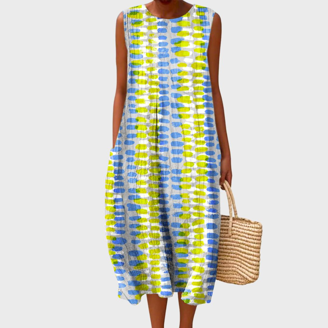 Effortless women's plaid sleeveless midi dress. Comfortable, casual summer style, perfect for day or vacation.