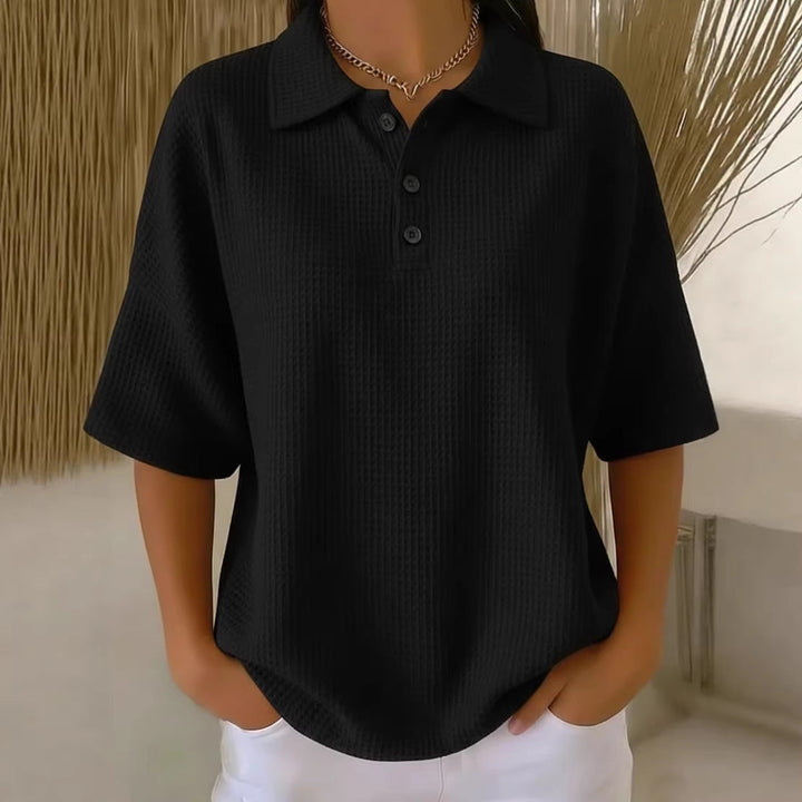 Stylish short sleeve women's waffle knit polo blouse. Loose fit for versatile spring & summer fashion.