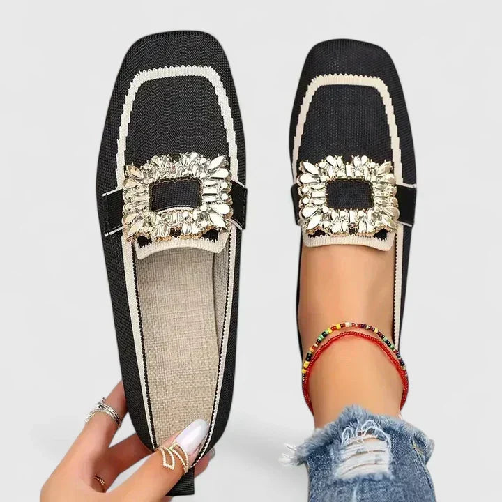 Comfortable women's slip-on square-toe loafers in black, featuring a chic crystal buckle for versatile style.