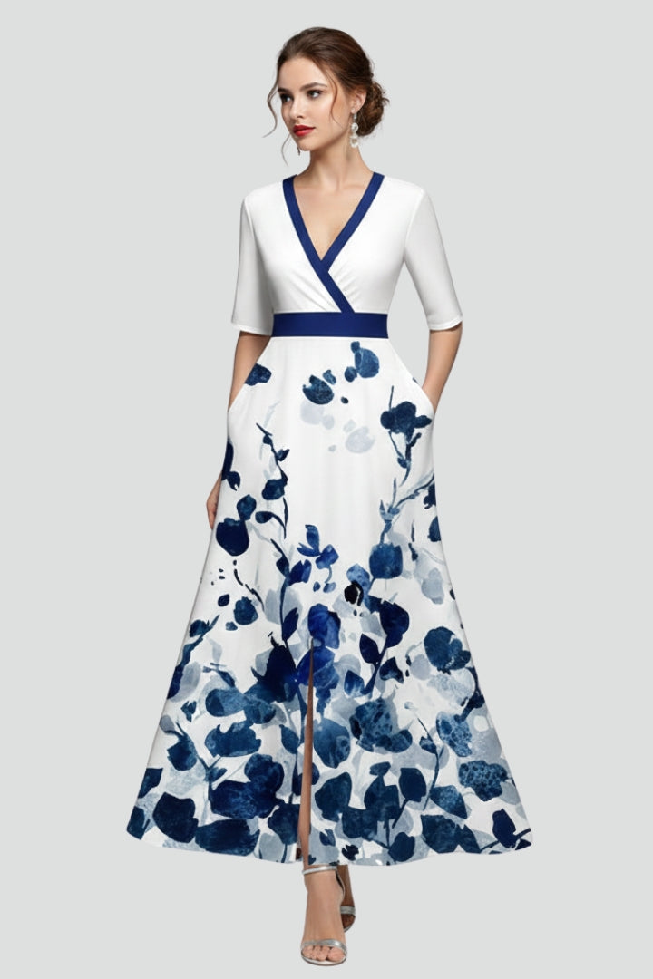 Elegant women's vacation maxi dress in floral print, with a V-neck, midi sleeves, and a stylish flared skirt.