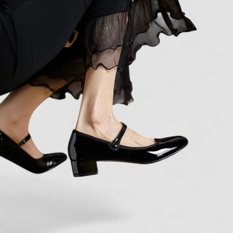 Versatile women's elegant patent Mary Jane shoes with a comfortable block heel & round toe, ideal for workwear.