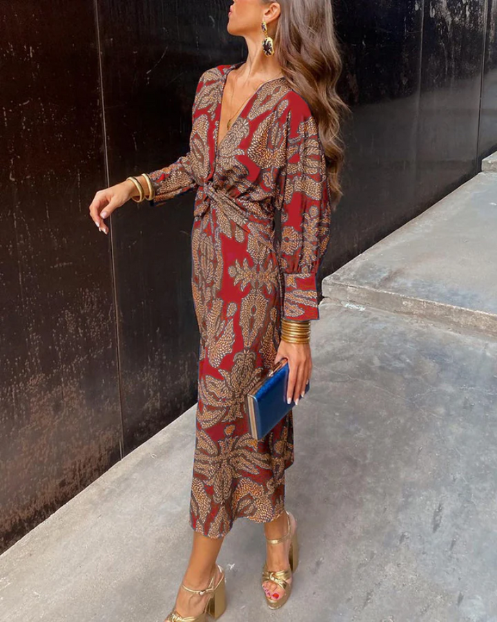 Elegant women's printed long sleeve V-neck evening gown, ideal for wedding guests.