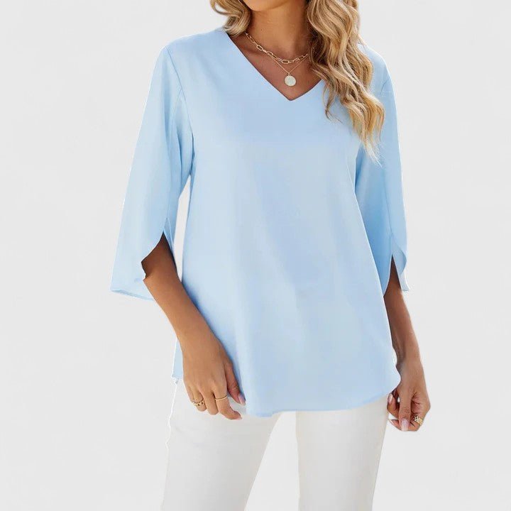 Women's elegant ruffle V-neck blouse with split sleeves, a versatile fashion top for spring & summer.