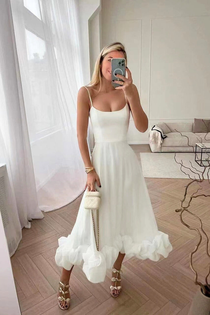 Sleeveless women's scoop-neck maxi dress, perfect as a summer wedding guest outfit.