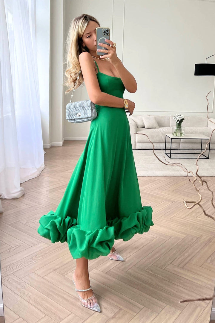 Elegant women's occasion wear: scoop-neck, spaghetti strap maxi dress for weddings.