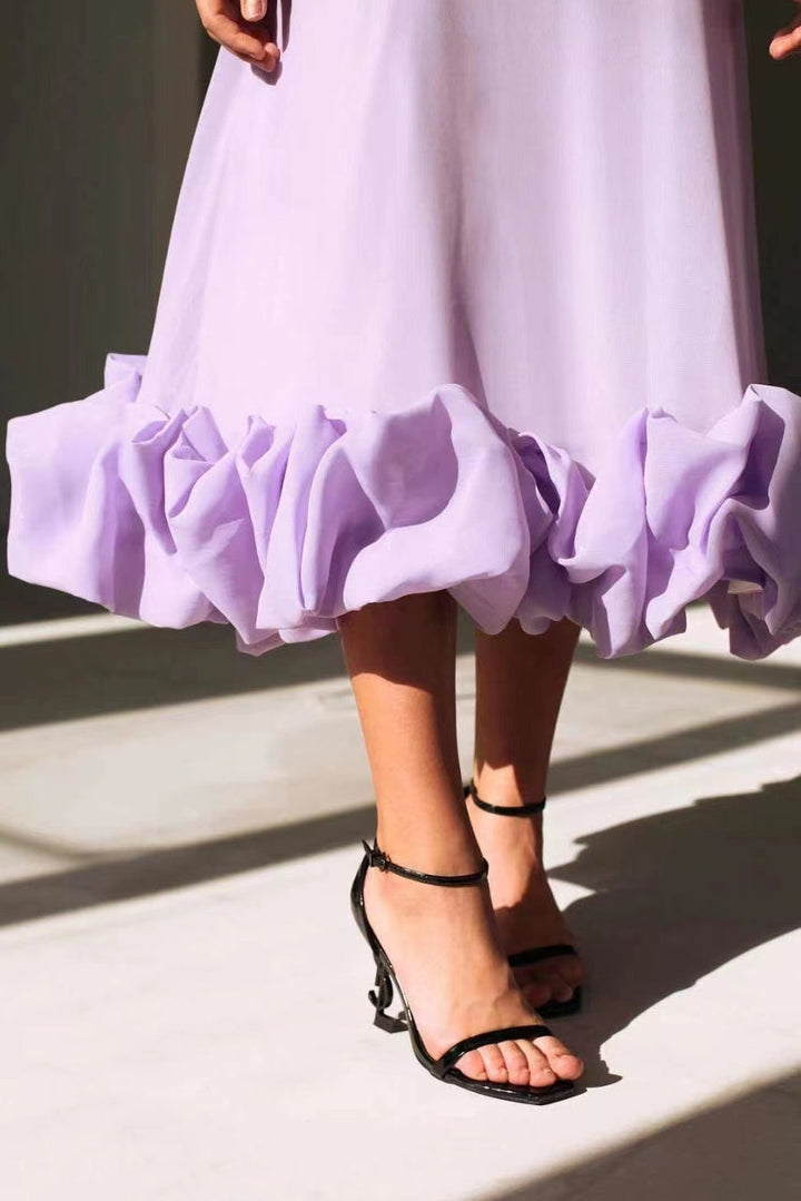 Sophisticated women's occasion maxi dress, scoop-neck, spaghetti strap for wedding guests.