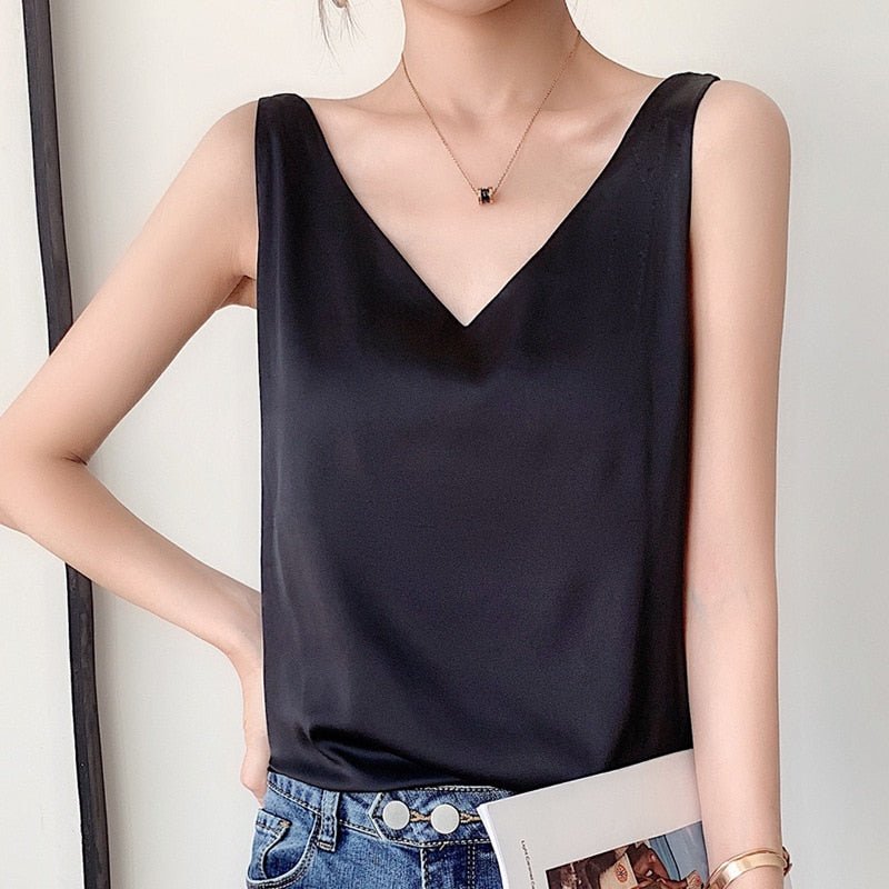 Women's elegant silky tank top with draped design. Polished sheen for a chic, versatile look.