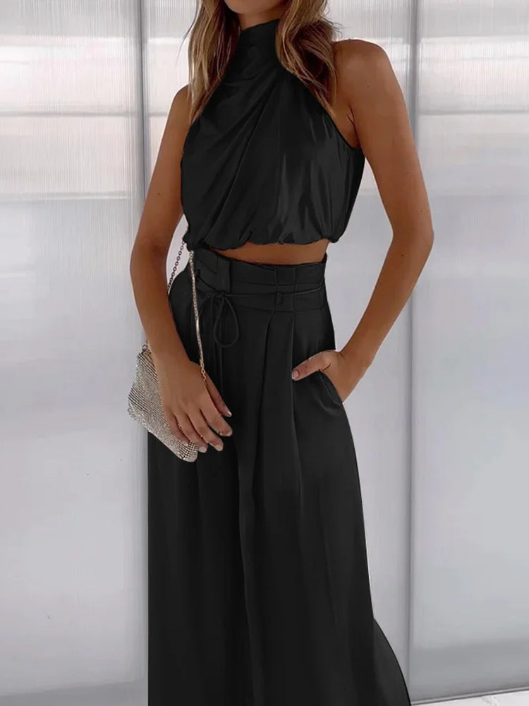 New women's elegant two-piece loungewear set. Stylish cotton linen blend matching blouse and comfortable trousers.