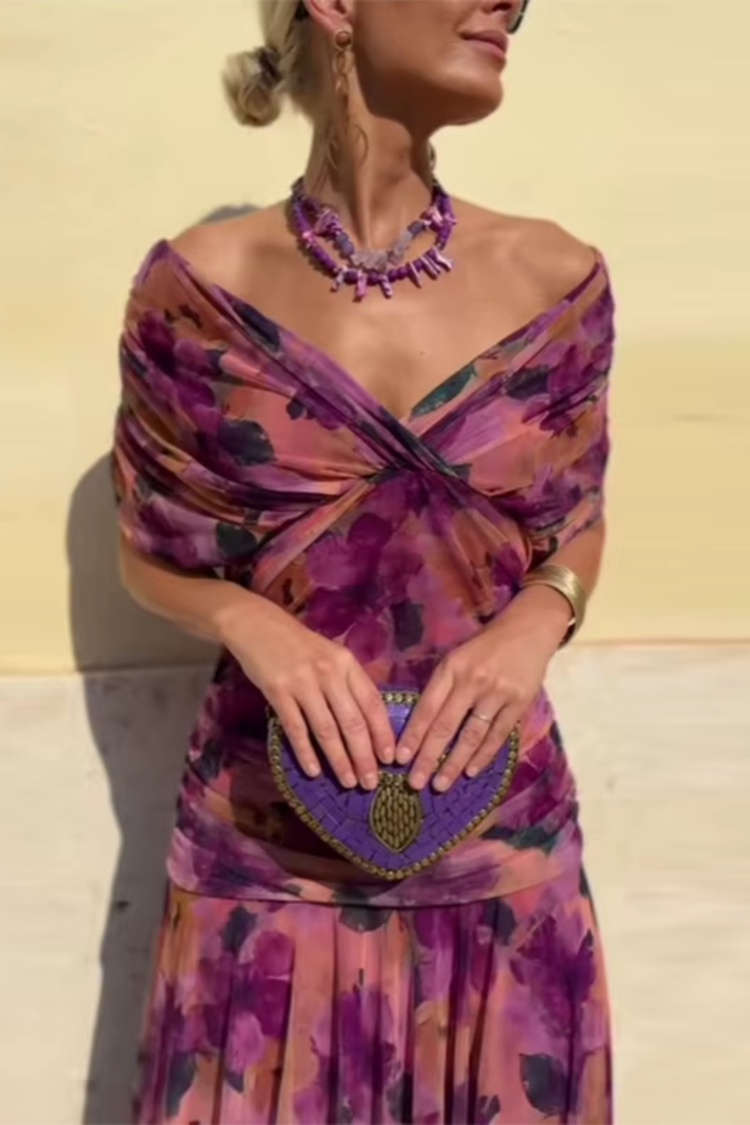 Elegant women's V-neck maxi dress with flutter sleeves & pleated waist. A versatile party & evening dress.