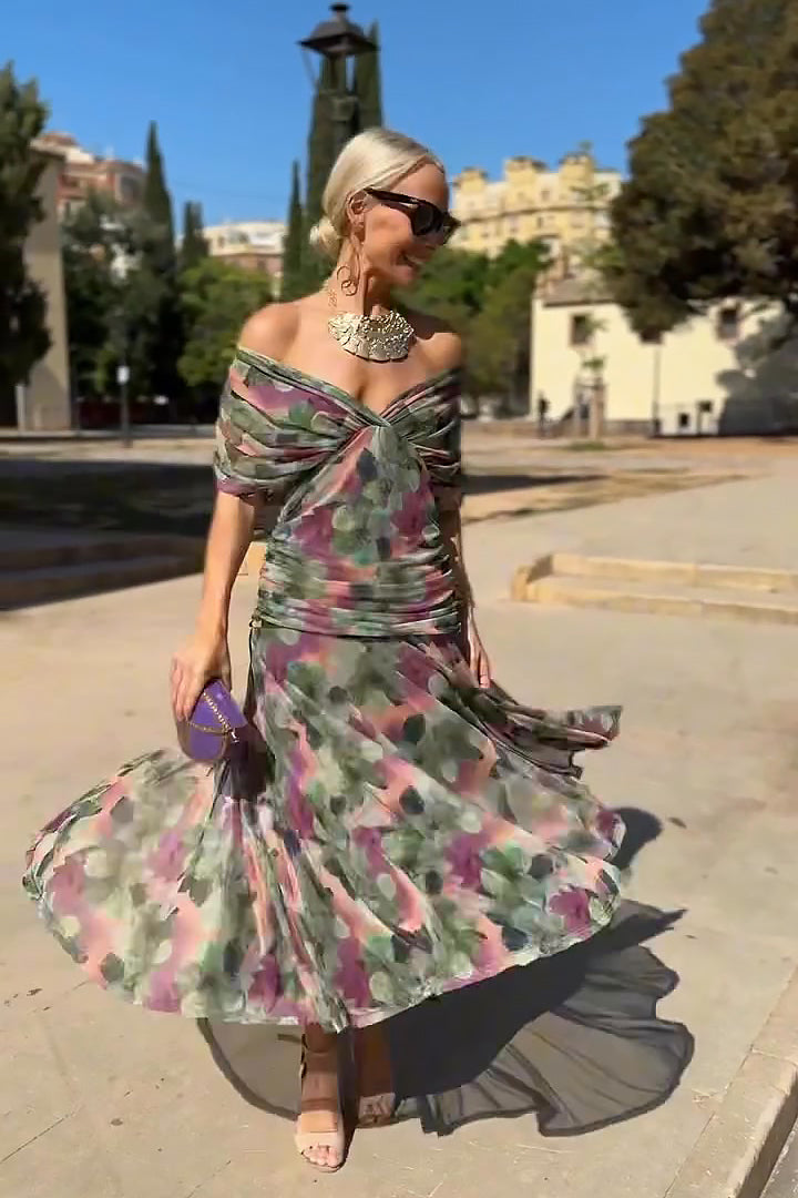 Chic V-neck maxi dress for women, featuring unique flutter sleeves and a flattering pleated waist.