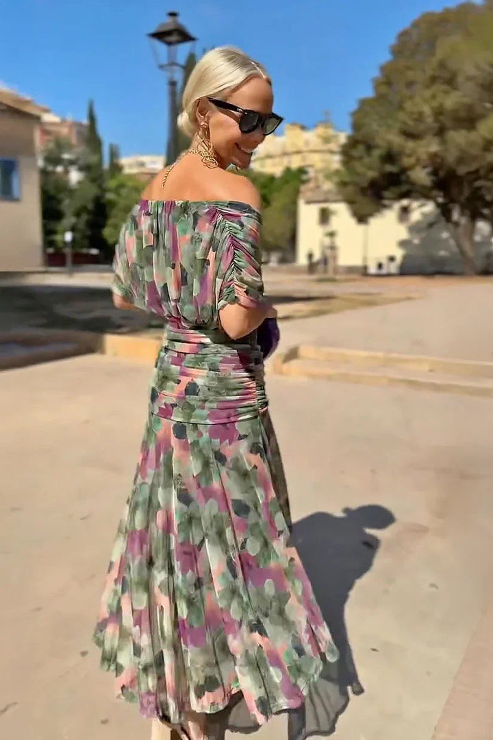 Formal women's maxi dress with sophisticated V-neck and flutter sleeves, ideal for evening or party wear.