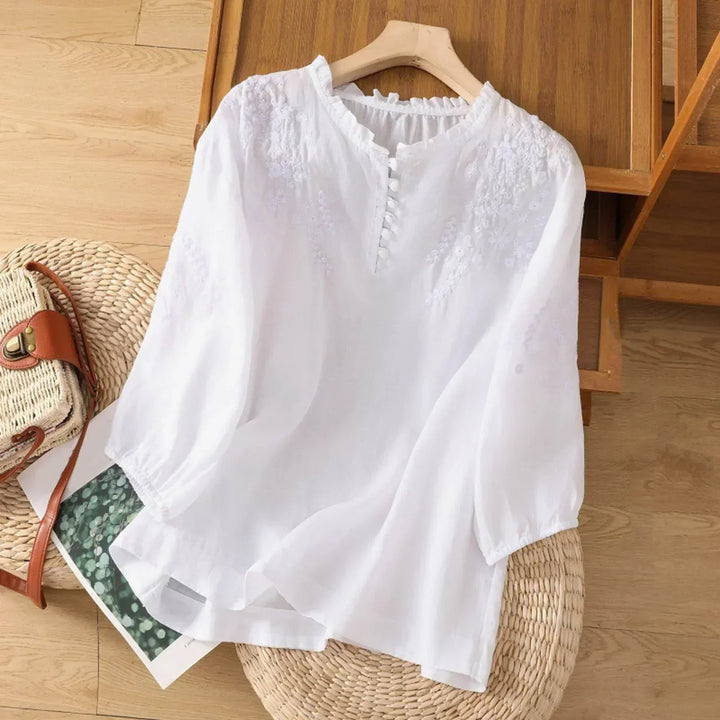 Sophisticated women's long-sleeve embroidered blouse, a versatile top perfect for casual spring or elegant office attire.