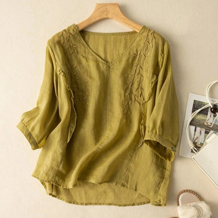 Casual elegant embroidered linen short-sleeve top for women, ideal for warm weather
