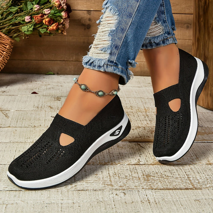 Cushioned women's slip-on sneakers. Ergonomic design provides all-day comfort for walking & travel.