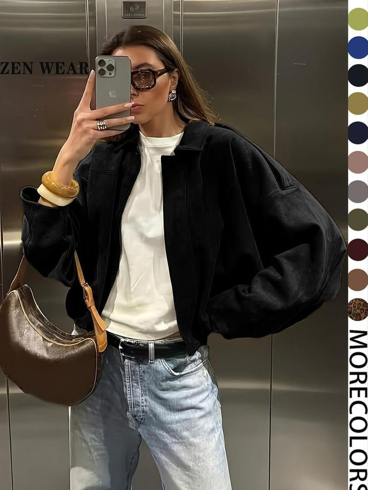 Stylish woman wearing a versatile faux suede zip-front jacket, perfect for everyday casual wear