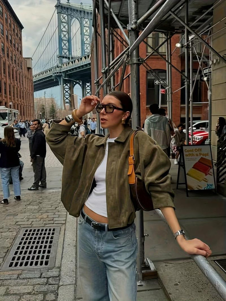 Women's autumn wear faux suede jacket with a classic zip-front design, offering comfortable style