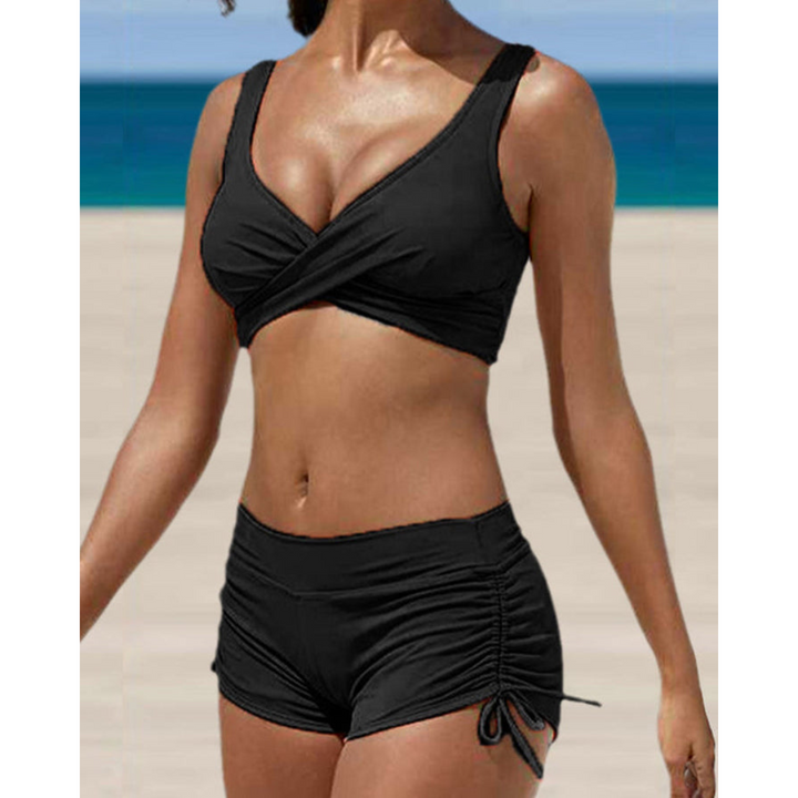 Women's flattering two-piece bikini swimsuit with high-waist tummy control, perfect for beach & pool.