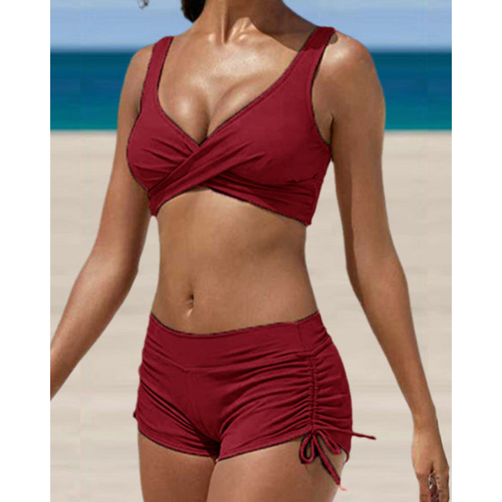 Stylish women's high-waisted two-piece bikini. Tummy control & supportive fit for confident summer beachwear.