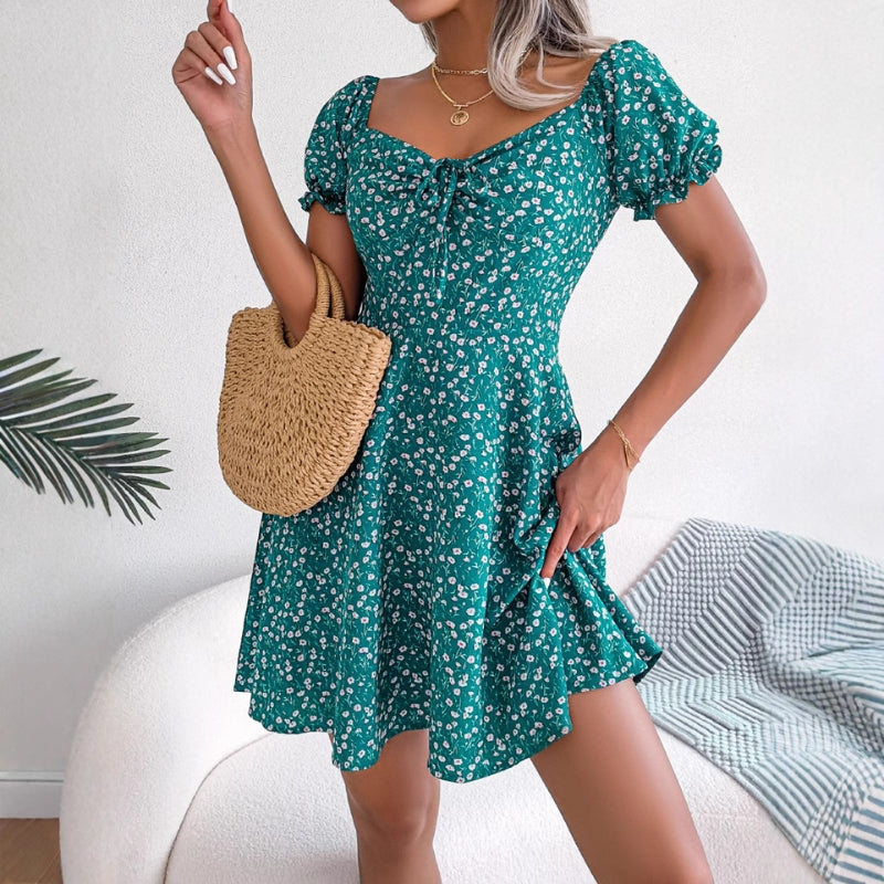 Women's floral A-line summer midi dress with ruffles, perfect for casual wear