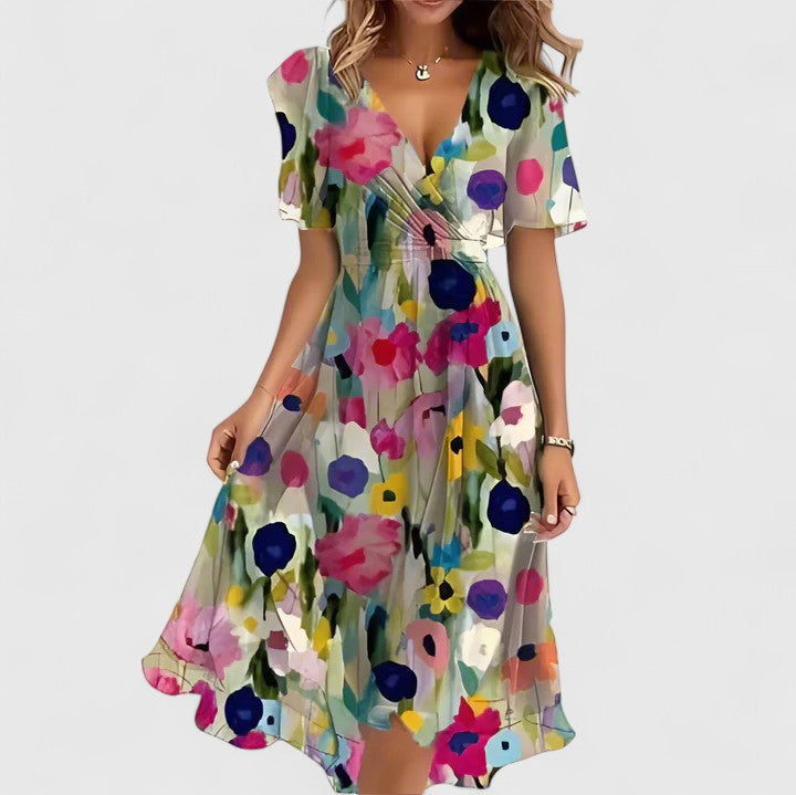 Comfortable women's floral midi dress with flattering flutter sleeves & v-neck, ideal for everyday style.
